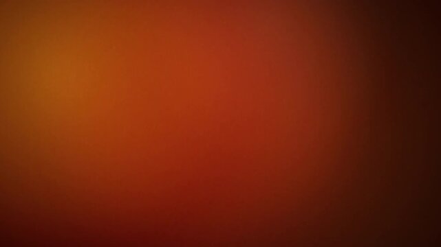Abstract warm red and orange gradient background animation with soft blurred light