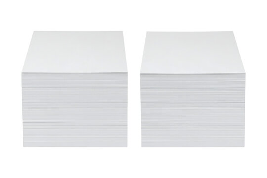 Two clean stacks of white blank paper sheets for office printing and professional document preparation organized in neat piles&nbsp;