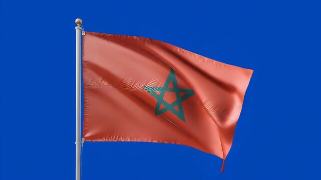 Dynamic Moroccan flag waving proudly against a plain blue screen background, symbolizing national pride and cultural identity in a global world