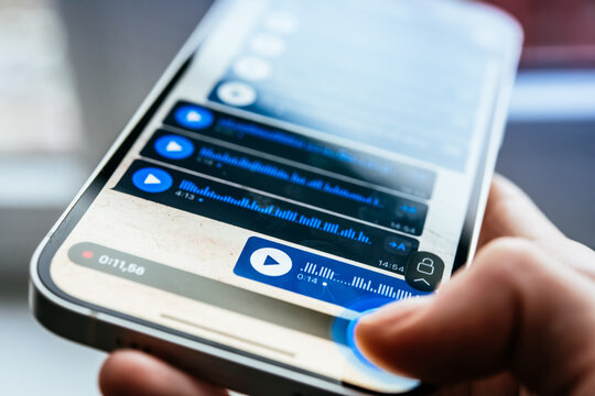 A person recording voice messages in a messenger.