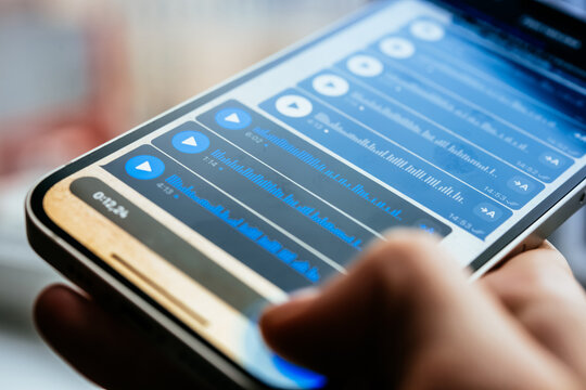 A person recording voice messages in a messenger.