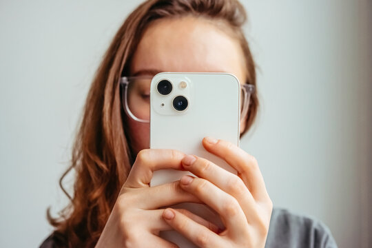 A content creator takes a mobile photo using a smartphone. Photography concept.