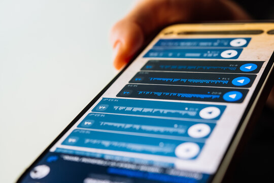 A person recording voice messages in a messenger.
