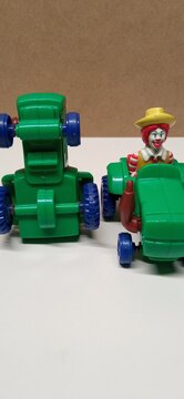 Vintage Green Toy Tractor with Clown Figurine mac donald