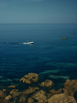 boat in the calm seas of Sardinia