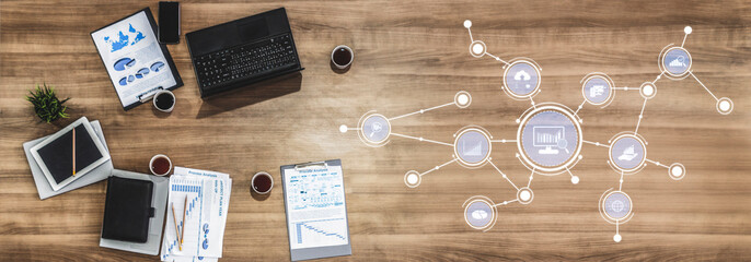 Naklejka premium A modern office workspace featuring a laptop, documents, and creative visualizations focused on data analysis, workflow management, and productivity techniques. Tessel