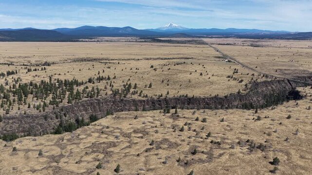 Over millennia Mill Creek has carved a 230-foot deep canyon on the Central Oregon plateau between Bend and Portland. This rugged yet scenic area of high desert is part of the Warm Springs reservation.