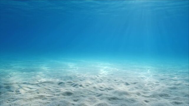 Luminous ocean background underwater with clear water and sand seabed seafloor ripple seascape nature marine blue horizon depth clean scenic serene peaceful aquatic pattern texture abstract dreamy