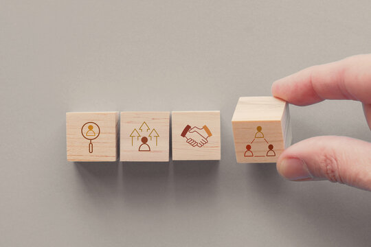 Hand holding wooden block with tick mark, good feedback rating and positive customer review, experience, satisfaction survey ,mental health assessment, checklist business concept