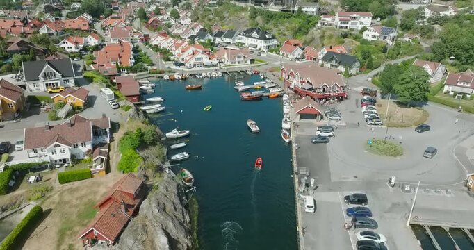 Aerial view of coastal marina and residential area in H&oslash;llen Norway