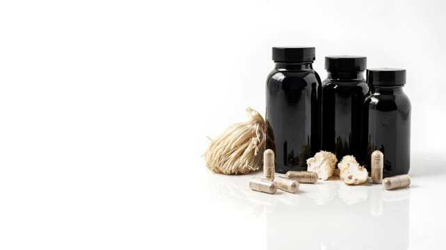 Lion's Mane mushroom supplement bottles with capsules and dried fruiting body
