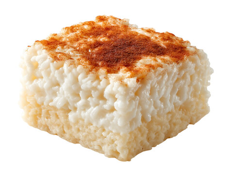 Creamy rice pudding square topped with a dusting of ground cinnamon, isolated on a white background.