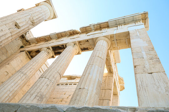 Dramatic low angle perspective of the Propylaea gateway on the Acropolis in Athens, Greece.