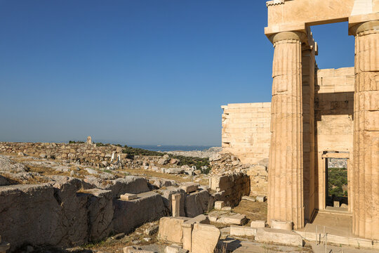 View of the Propylaea and archaeological remains on the Acropolis overlooking Athens, Greece.