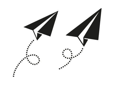 Two paper airplanes flying with looping dotted path line flat black silhouettes vector design