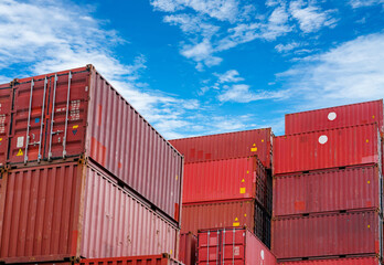 Fototapeta premium Container logistic. Cargo and shipping business. Container ship for import and export logistic. Container freight station. Logistic industry from port to port. Container at harbor for truck transport.