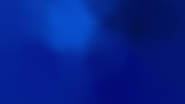 A seamless loop animation featuring soft flowing blue gradients with subtle moving light and shadow
