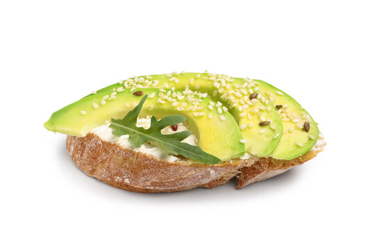 Tasty bruschetta with avocado on white background