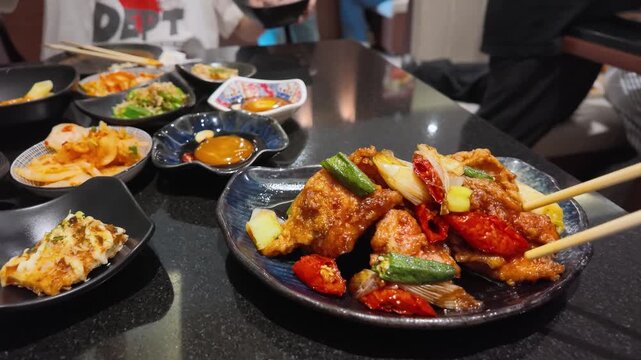 Asian Fried Chicken with Spicy Chili and Okra in Bangkok Restaurant