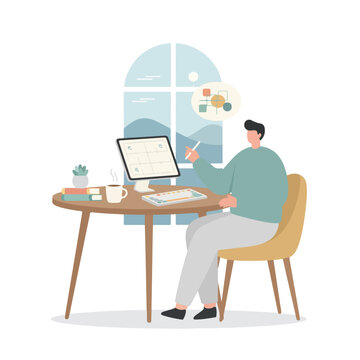 An illustrator sits at a desk in a home office, using a tablet and computer to create digital art while gazing at a mountain view.