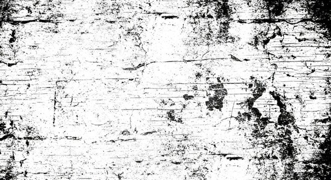 A black and white photograph of a wooden surface with visible cracks and scratches.