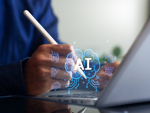AI Artificial Intelligence. Business man using AI technology for data analysis, coding computer language with digital brain, machine learning on virtual screen, business intelligence