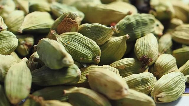 Cardamom seeds are sorted and packaged for sale