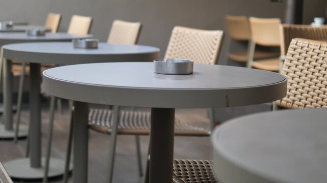 Empty tables at a cafe waiting for customers