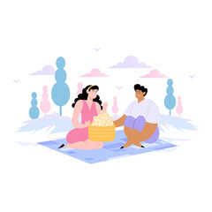 Obraz premium Couple sharing food on an outdoor picnic.
