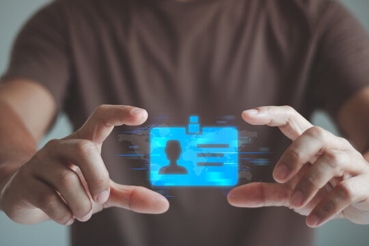 Businessman holding futuristic digital identity card interface, secure authentication, online verification, cybersecurity, personal data protection, digital identity, global security access technology