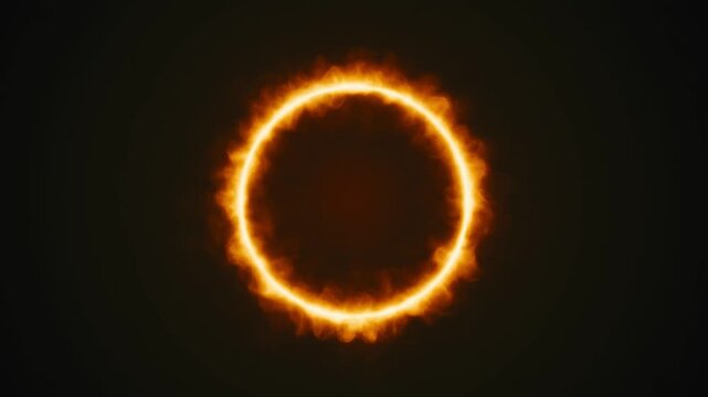 Abstract burning ring of fire or circular flame glowing with hot orange light on a dark black background featuring a seamless loop for motion graphics or video backgrounds