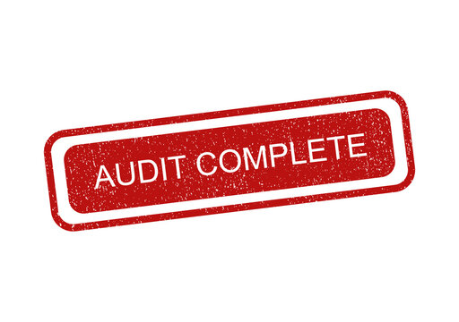 Red rubber ink stamp with the text audit complete for business and finance work isolated on transparent background