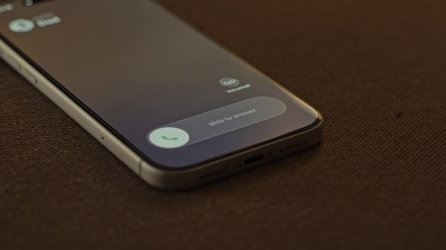 Person Receiving and Answering an Incoming Call on a Smartphone.