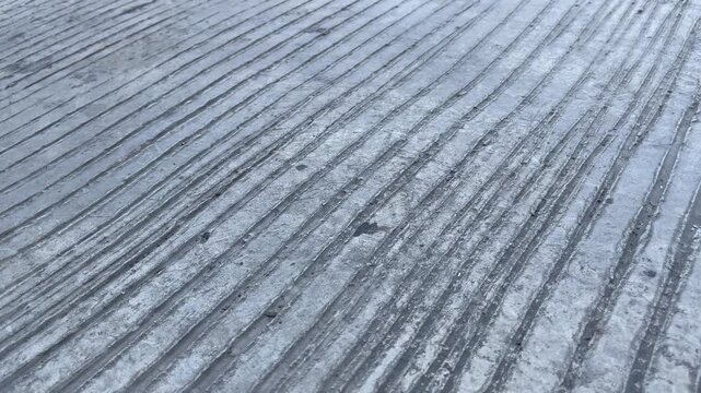 High angle diagonal grooved concrete texture