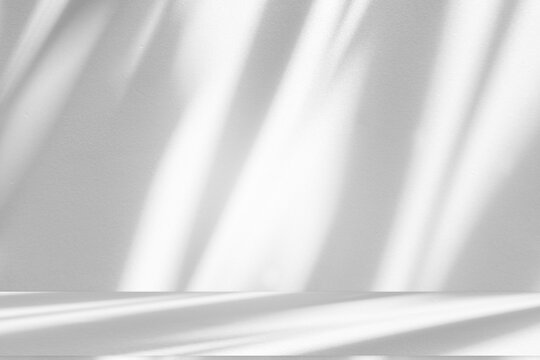 Wall interior background, studio and backdrops show products.with shadow from window color white and grey. background for text insertion and presentation produc