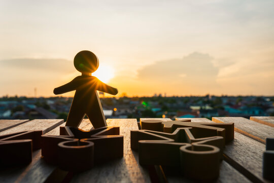 Wooden human figure standing out leadership success business concept team outstanding human resources management strategy development individual index.