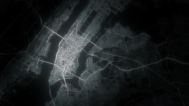 Night view of a city grid glows softly. Dark waters separate two urban landmasses. Roads and streets shine faintly in the dark. Silent, complex network of lights stretches across the scene