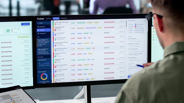 IT Support Specialist Resolving Customer Helpdesk Tickets