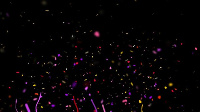 Confetti particles swirl in a soft glowing pattern against a deep black background to provide a festive aesthetic for creative media.
