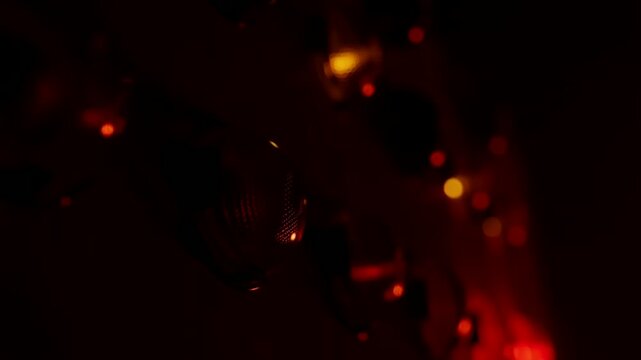Red warning light and yellow indicator glowing on control panel, emergency alert signal and illuminated button create urgent atmosphere with red yellow glowing caution in dark technical environment