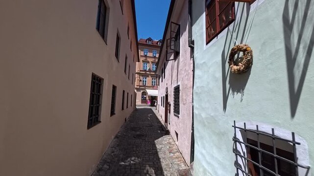 POV walking shot through narrow cobblestone streets of Cesky Krumlov history