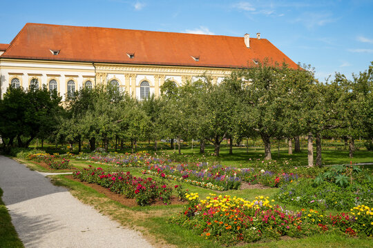 The beautiful courtyard garden of Dachau Castle in Upper Bavaria. In the background is the Baroque-style garden fa&ccedil;ade of the former electoral summer residence of the Wittelsbach family.