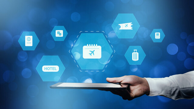 Travel booking on a tablet with icons for hotel, flight, and travel documents in a digital setting