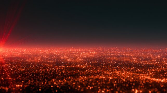 Vast Urban Landscape Illuminated by Fiery Orange City Lights at Night.
