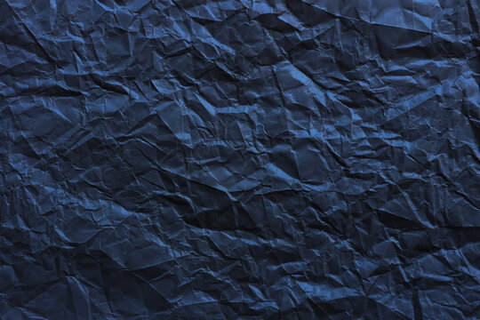 Abstract black crumpled paper texture