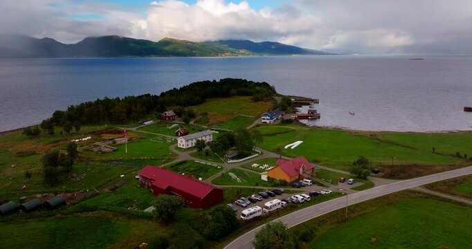 Drone medium orbit of Kvitnes Gaard coastal estate near Sortland in Vesteralen, aerial