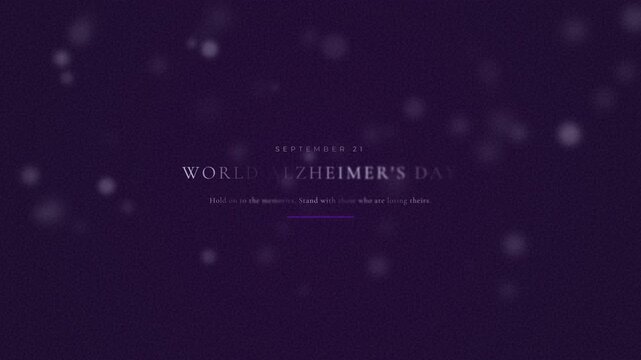 World Alzheimer's Day animated text on a purple background with bokeh particles