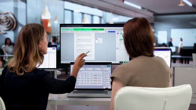 Woman Manager Reviews Contract Details