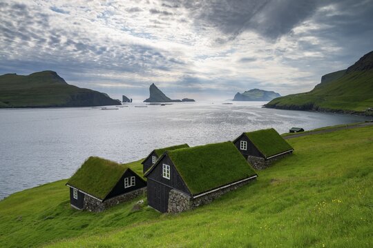 Traditional houses in the village of B&oslash;ur, Tindh&oacute;lmur and Drangarnir, V&aacute;gar Island, Faroe Islands, Denmark