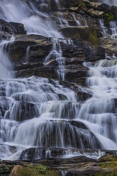 Mae Ya waterfall with cascading flowing water, near Doi Inthanon National Park, Chiang Mai Province, Thailand